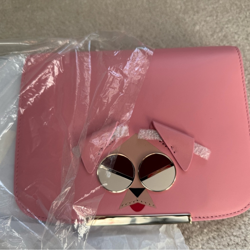 Kate Spade make it mine mad dog 
This is the flap ONLY!